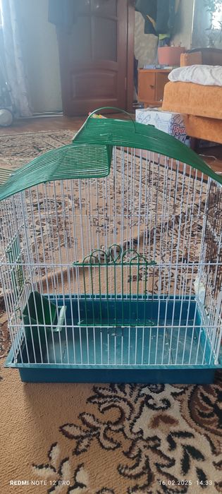 Клітка для попугайв