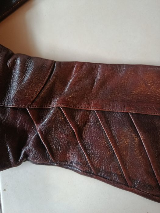 Bota cano alto pele genuína