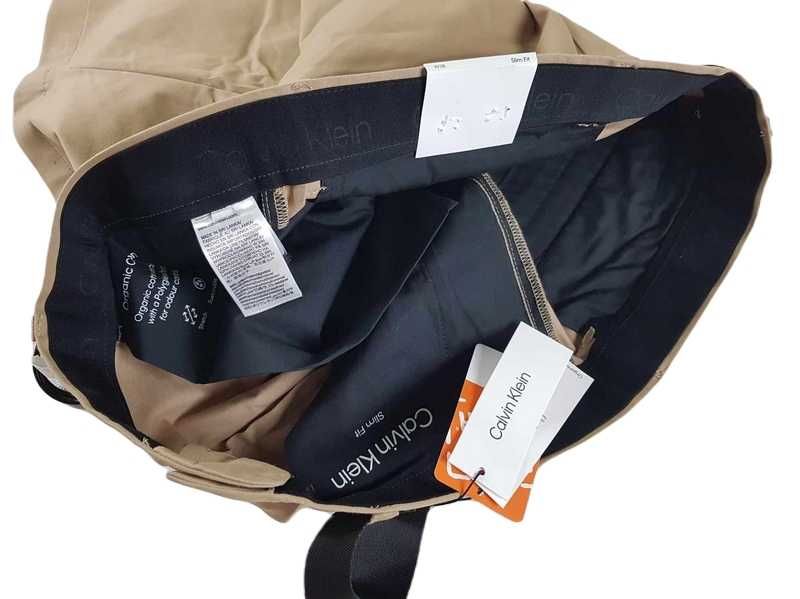 Męskie spodenki Calvin Klein -beżowe shorty z paskiem K10K111788 - W38