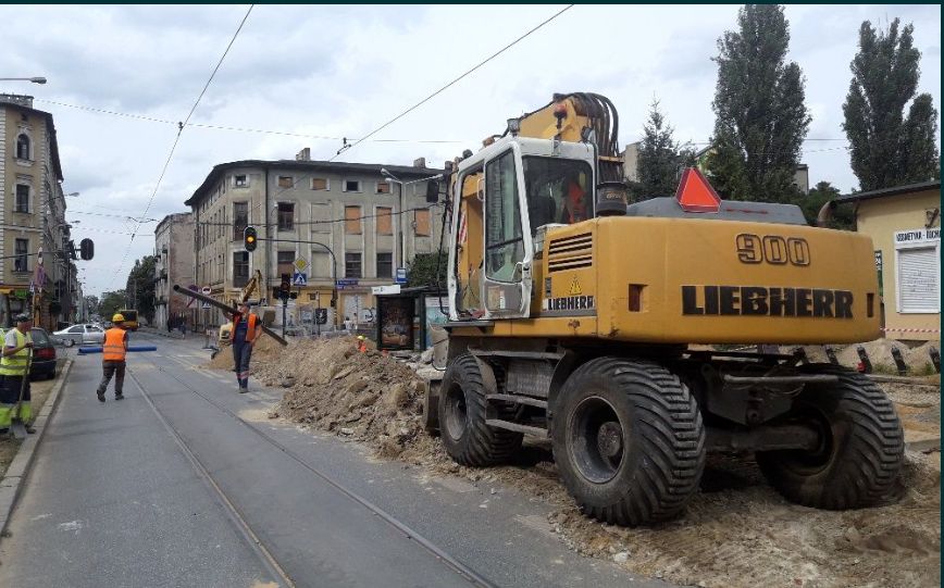 Niwelacja terenu, prace ziemne, spych, cat, koparka, walec, równiarka