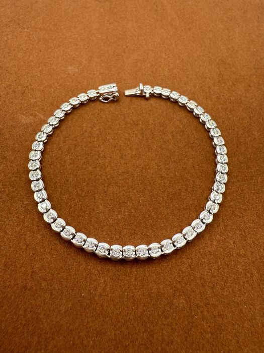 Złota bransoletka 750 z diamentami 2,20ct VS1/G-I (wycena na 20 000zł)