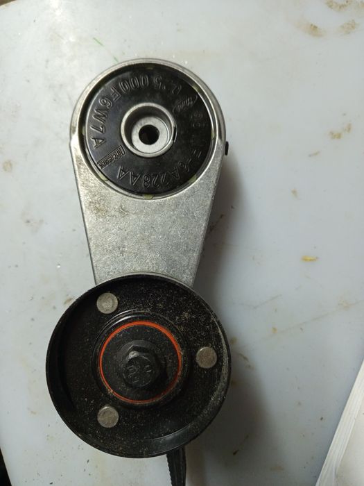 Натяжитель ремня генератора