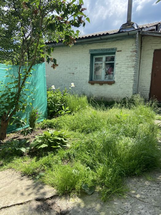 Продам земельну ділянку з будинком