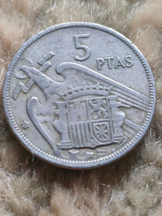 moeda de 5 pesetas de 1957, estrela 65