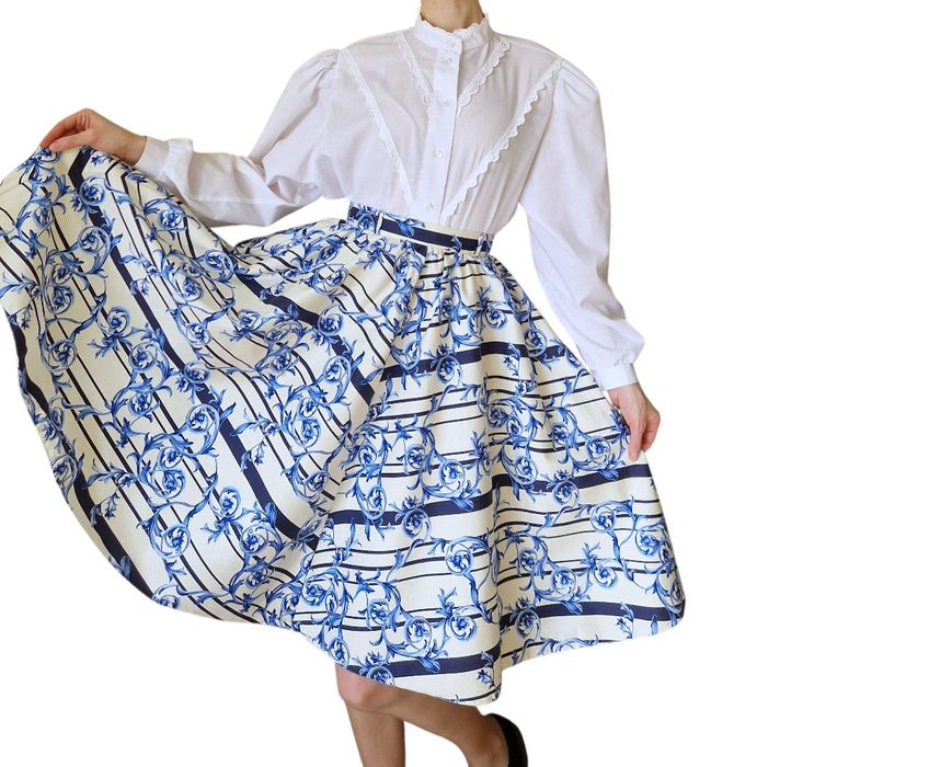 Midi rozkloszowana spódnica  w kwiaty XS