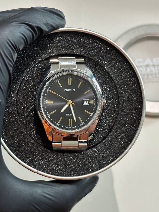 Годинник Casio MTP-1302/Часы касио