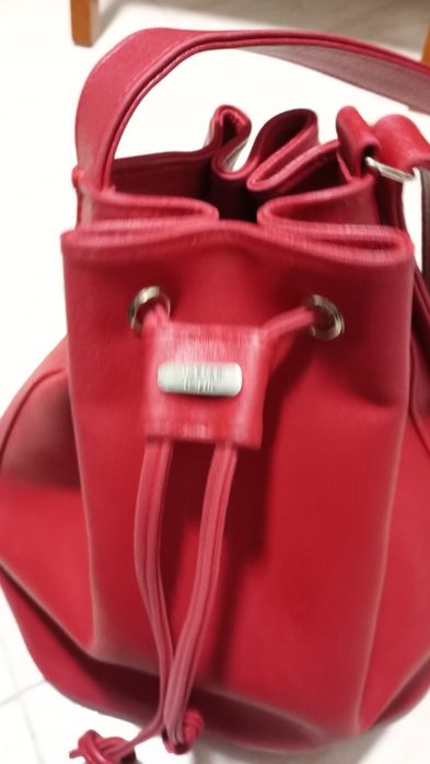 Mala vermelha em pele