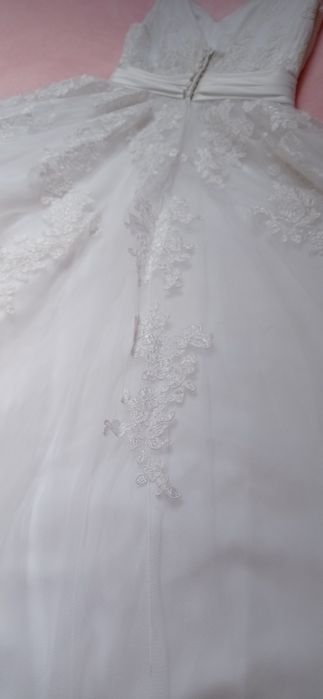 Suknia ślubna White One.