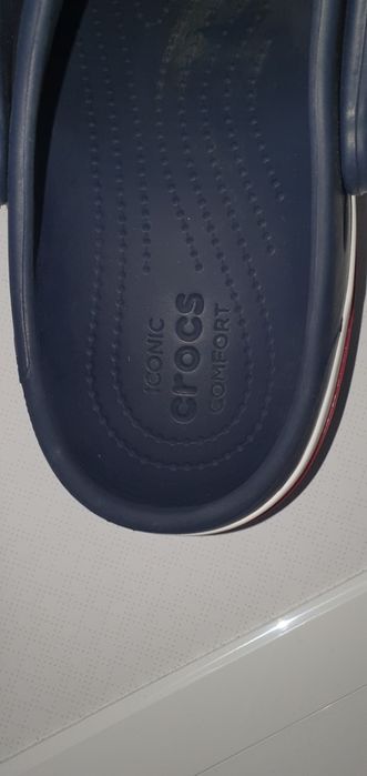 Нові Crocs тапочки оріг