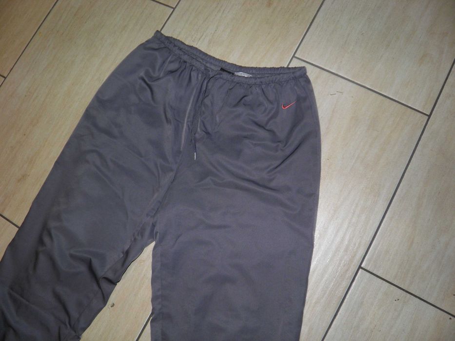 Spodnie dresowe damskie Nike r M .