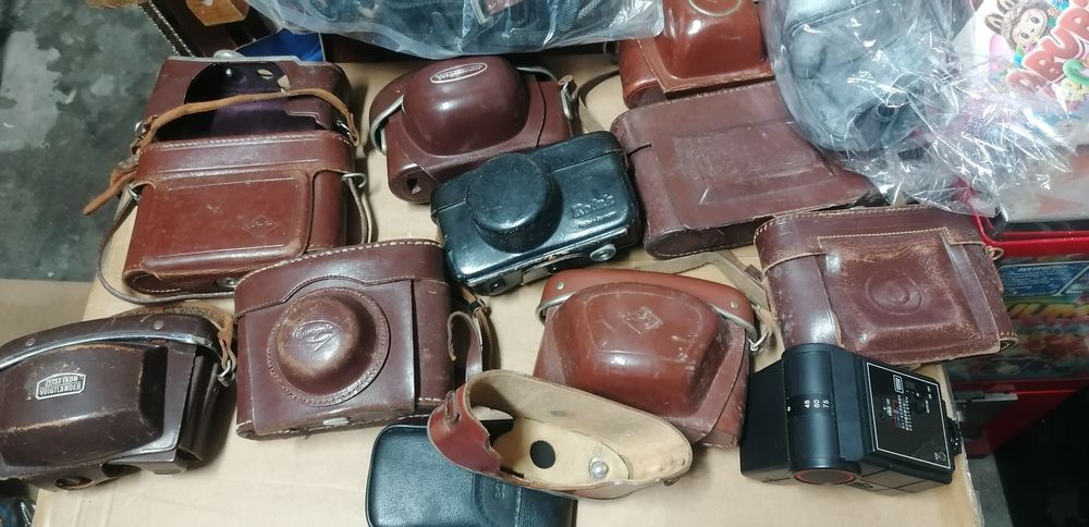 Conjunto bolsas couro máquinas fotográficas