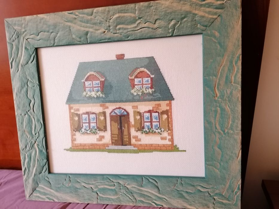 Quatro quadros bordados
