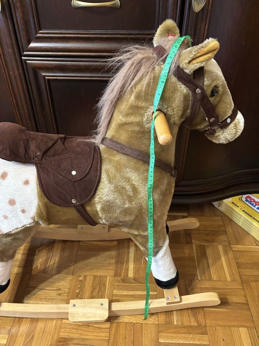 Koń na biegunach , wydaje dzwieki TEDDY KOMPANIET
