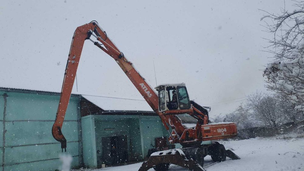 Колісний екскаватор для перевалки Atlas 1804