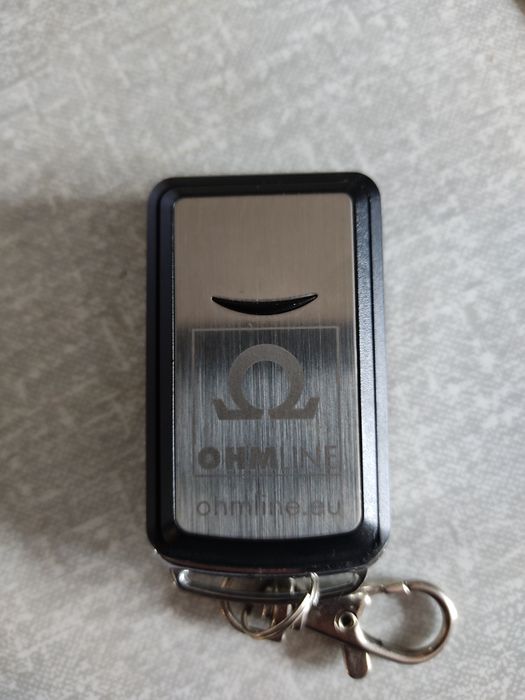 Comando de portão, novo.