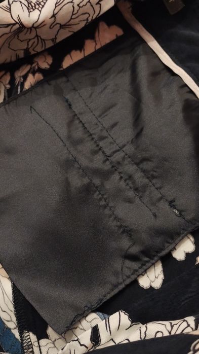 Spodnie typu palazzo z cupro marki Laura Ashley.