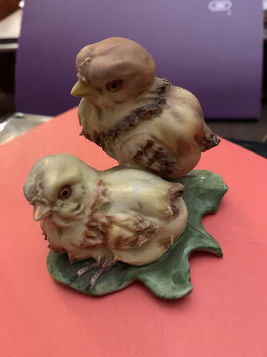 Estatueta de pássaros