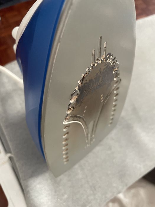 Ferro de engomar a funcionar