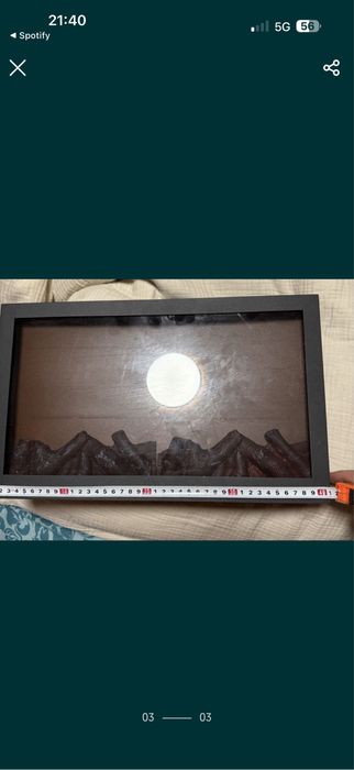 Elektryczny kominek imitujacy ogien