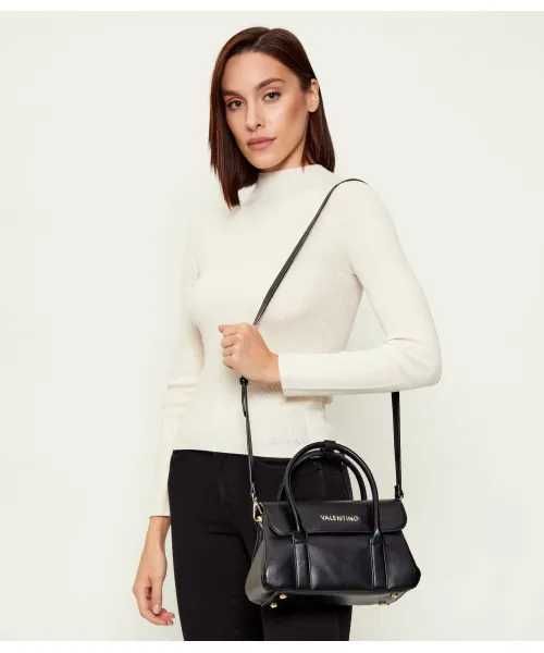 Valentino
Kuferek West Re