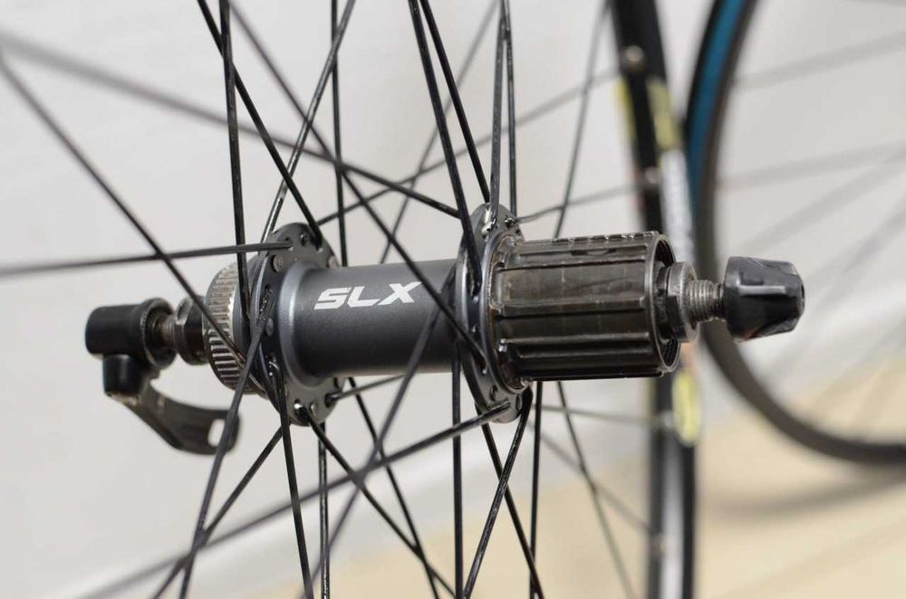 26" колеса Mavic / Shimano SLX, під дискові гальма, втулки Shimano SLX M665, барабан 8+ швидкостей на 4 собачках, вага 972 + 1191 г