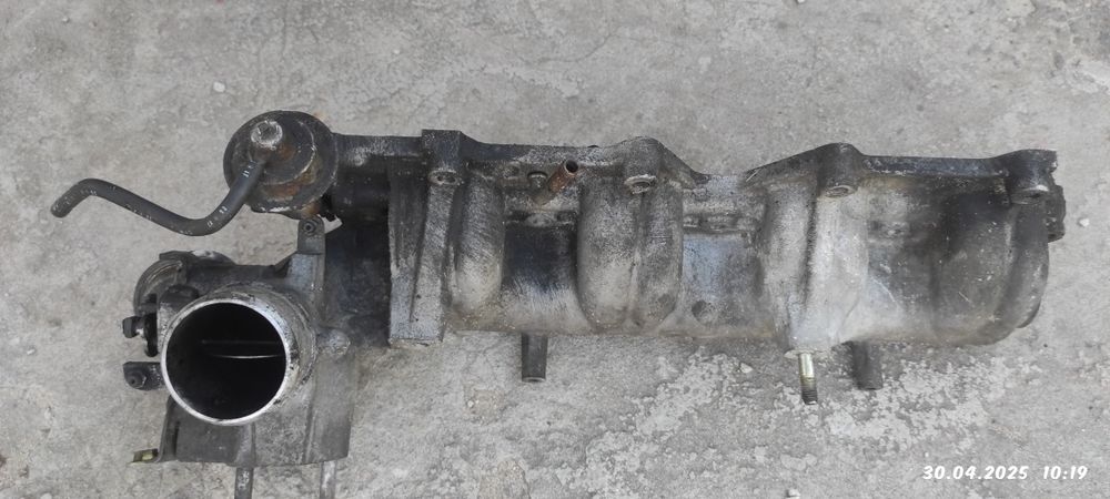 Впускний і випускний колектори Мазда диз.2.0 rf5c