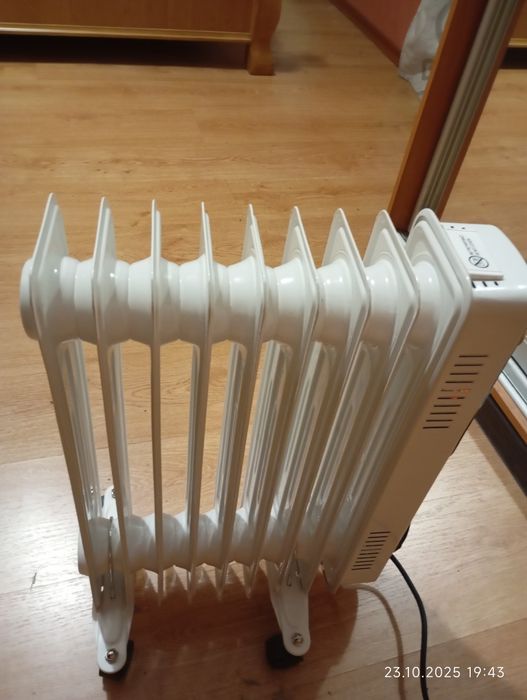 Масляный обогреватель