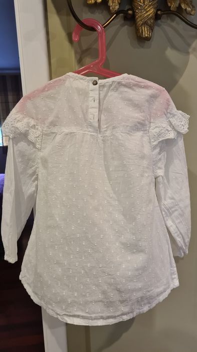 Blusa com folho no cabeção para menina de 7-8 Anos. ZY