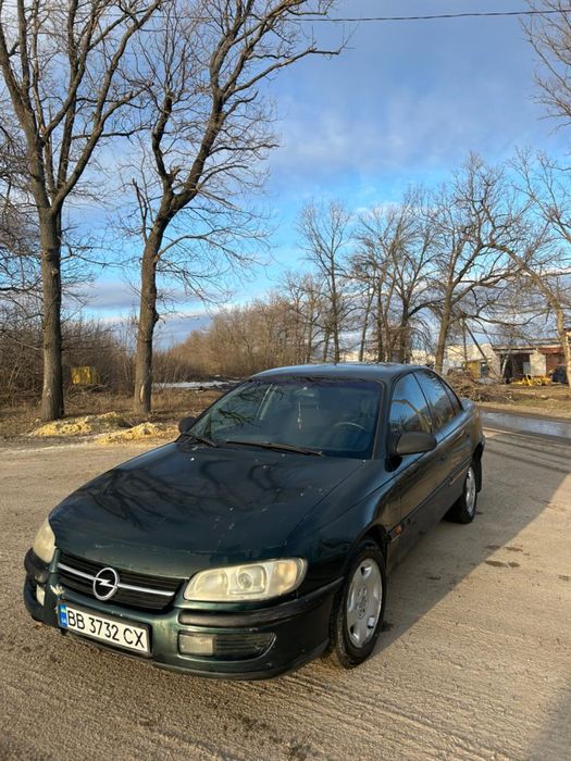 Opel Omega B  2.0 бензин