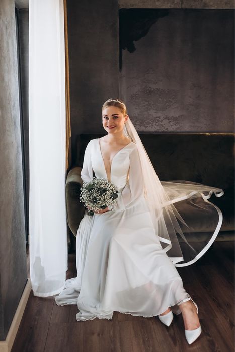 Прокат нових весільних суконь