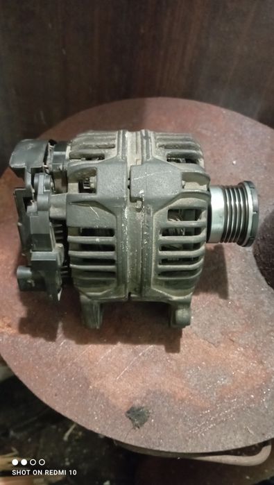 Генератор Бош Опель Віваро 1.9