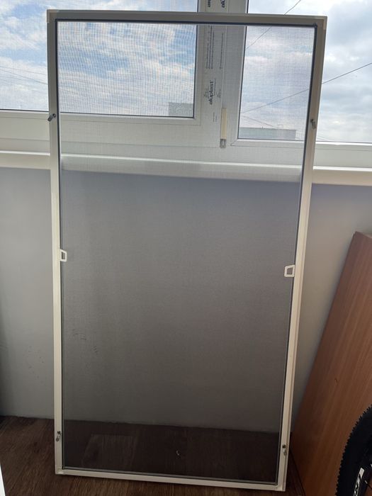 Маскитная сетка (новая)2шт.675*1285 и 670*1270.