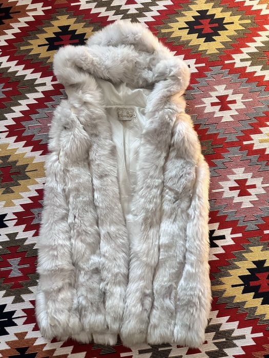 Безрукавка нова