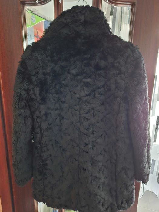 Kispos e casaco pelo