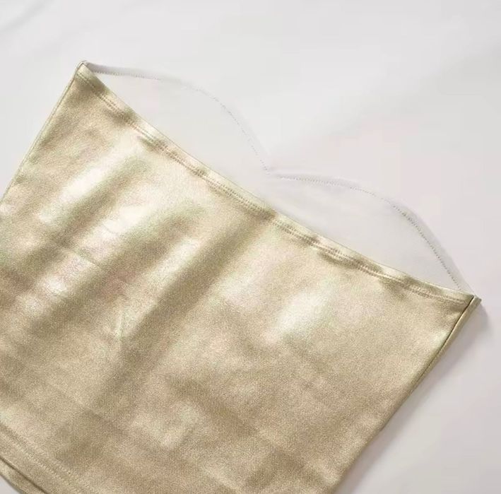 Топ з золотистої еластичної тканини