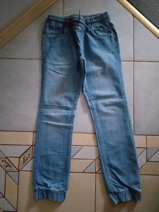 Spodnie dżinsowe, dresowe, polarowe, bawełniane rozm.146 cm. 5 szt.