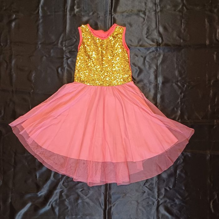 Святкова сукня на дівчинку в золотих паєтках