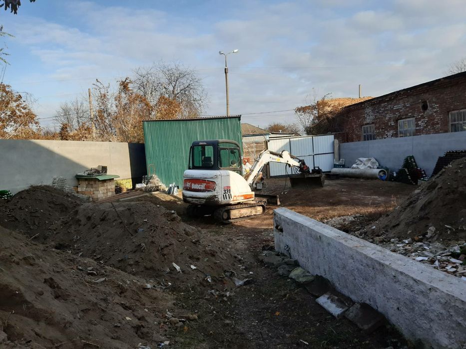 Послуги гусеничного трактора єкскаватор