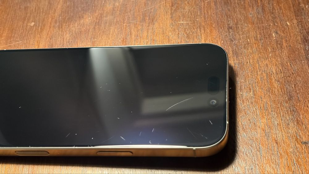 iPhone 16 Pro 128GB Titanium – Used, Minor Screen Scratches