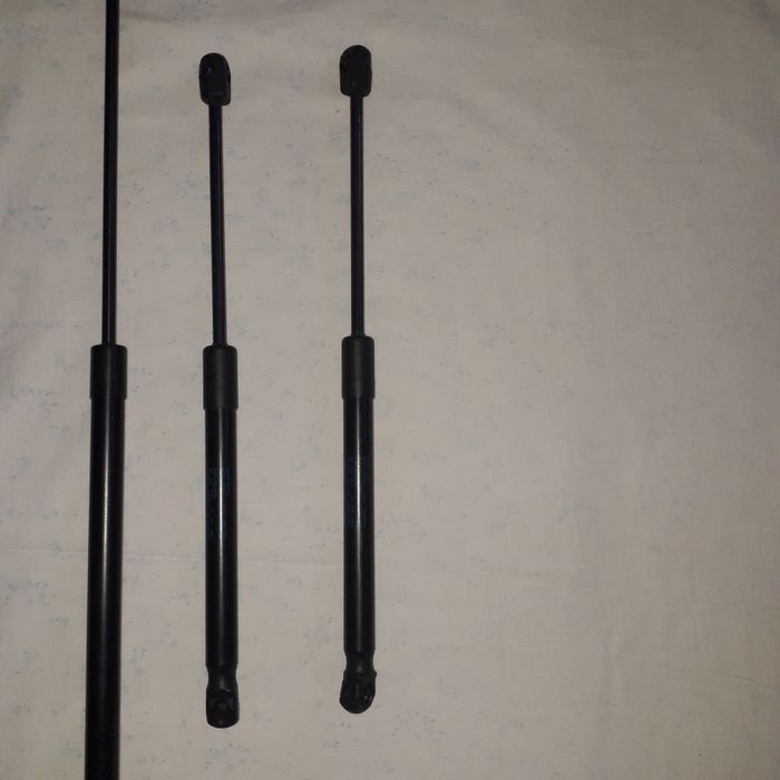 Амортизатори капота, перед і зад на пассат б7.