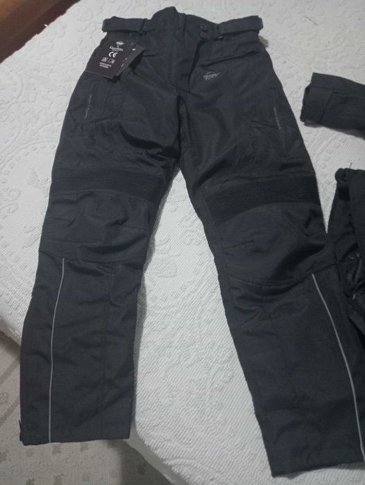 Fato para mota, blusão semi novo, calça por estriar