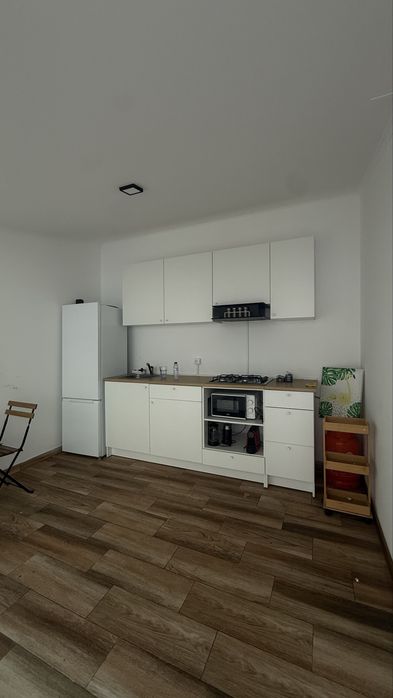 Quarto grande em anexo com cozinha