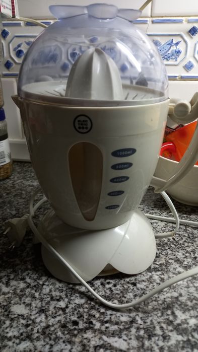 Espremedor de laranjas eletrico