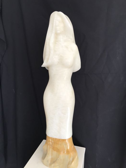 Escultura em pedra onix