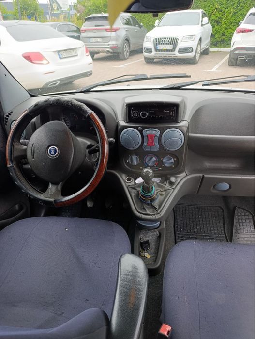 Машина Fiat Doblo