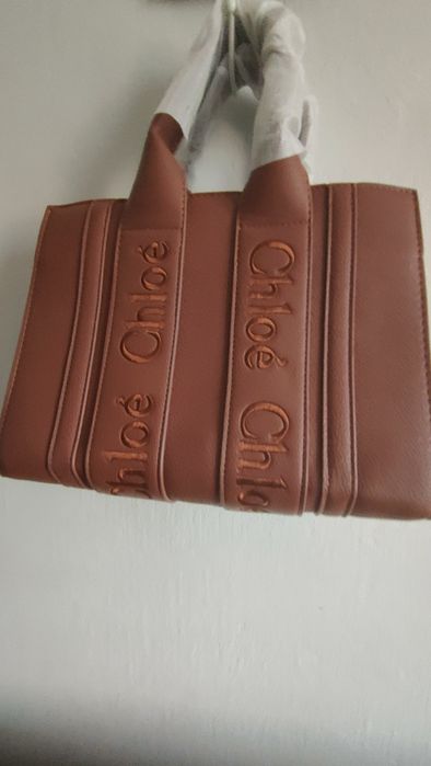 Mała nowa  torebka z napisem Chl