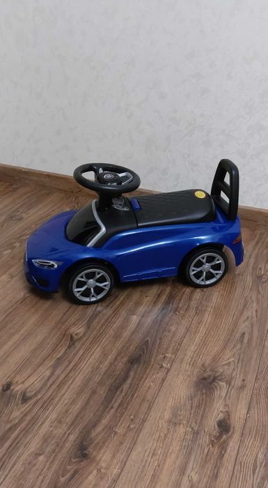 Машина-толокар для катання Tesla JOY з музичним кермом