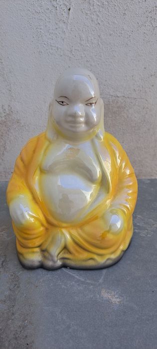 Buda em louça para desocupar