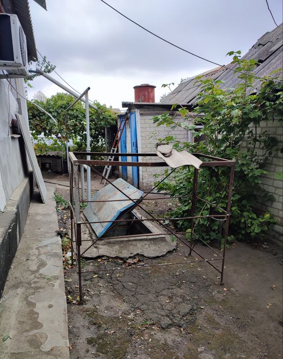 Продам в Харківській  обл, м.Балаклії 1/2 частку часного будинка