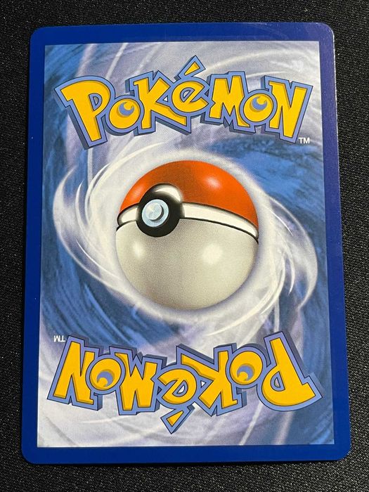 Carta Pokémon Garbodor V 100/203 Evolving Skies